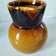 Glazed earthenware jug