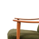 Pair of mid century Danish reclining lounge chairs in teak