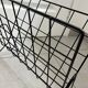 Black metal wire magazine rack
