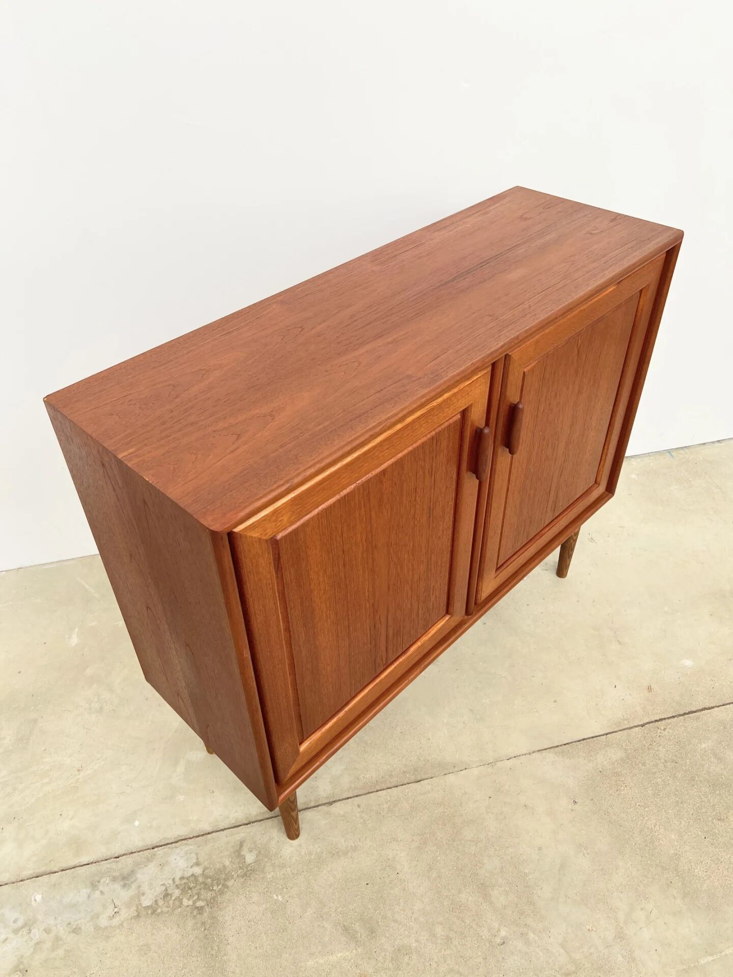 Small teak buffet with 2 doors, vintage Scandinavian style.