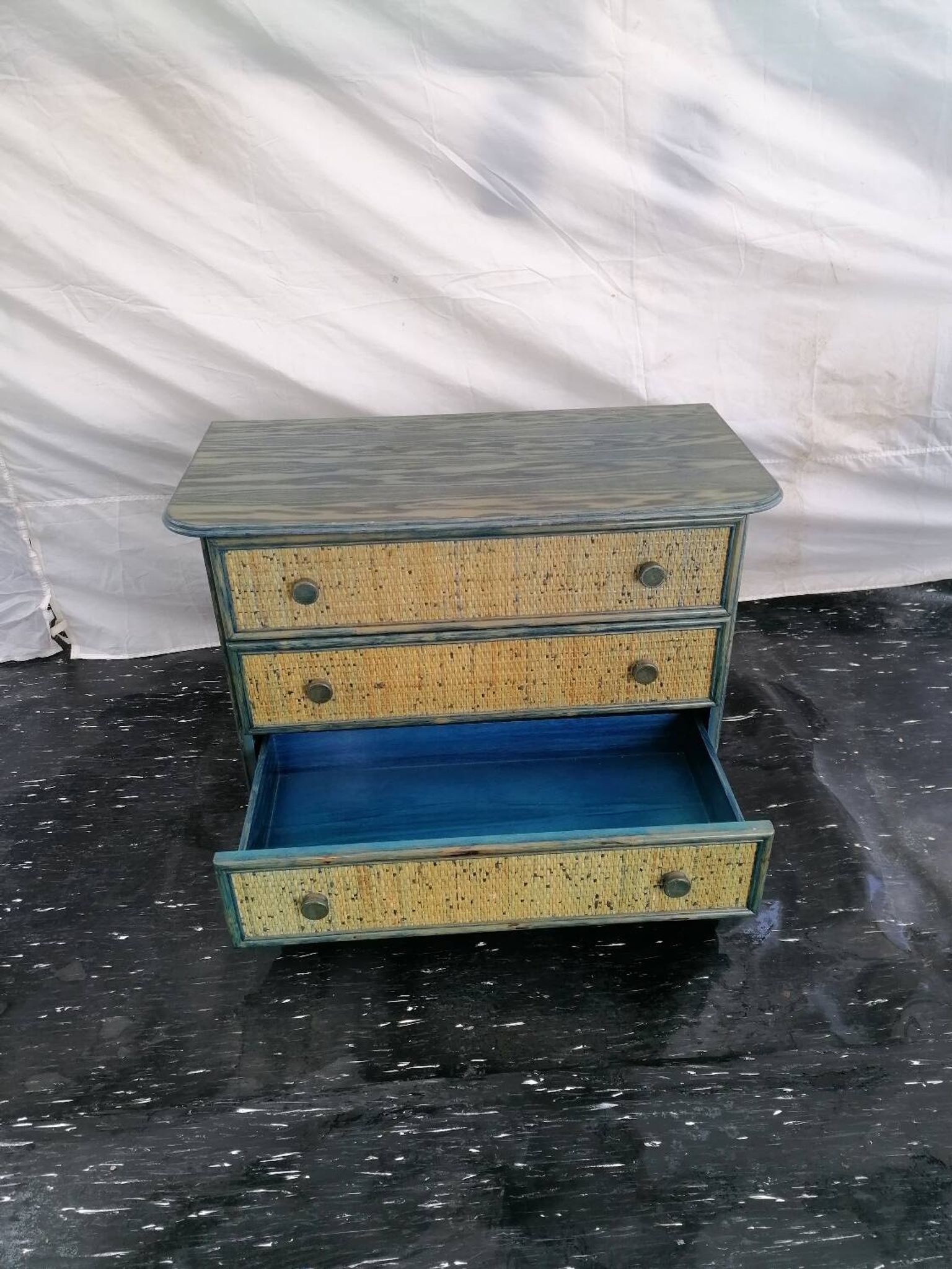 Maugrion chest of drawers in green and blue rattan