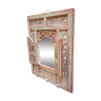 coat rack with pink and white mirror