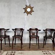 Série de 4 fauteuils vintage en bois courbé – Élégance intemporelle