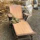 Old rattan lounger.
