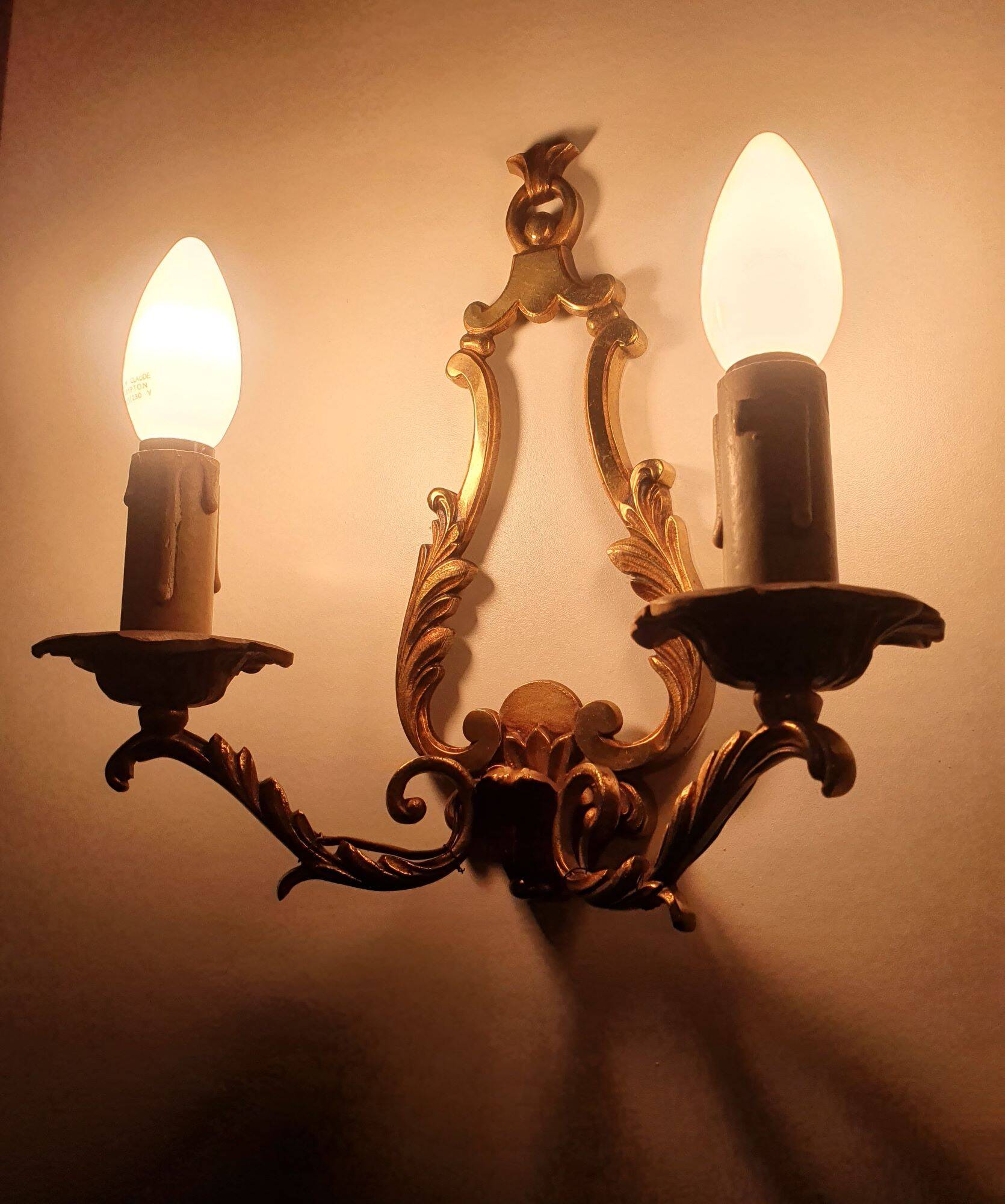 Pair of antique candlestick wall sconces