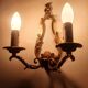 Pair of antique candlestick wall sconces