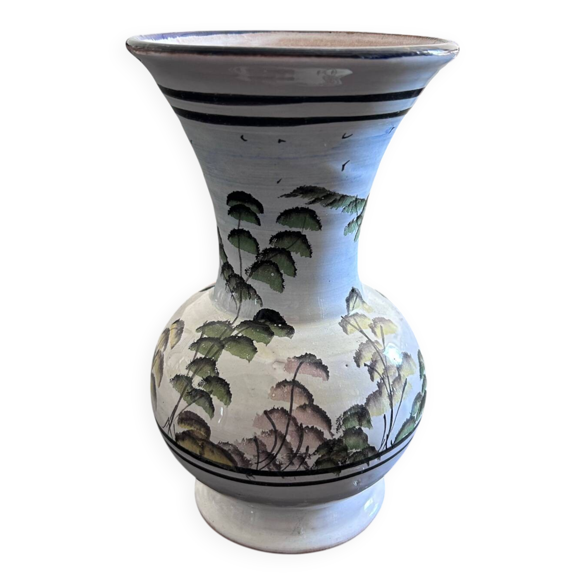 White vase with plant decoration
