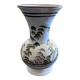 White vase with plant decoration