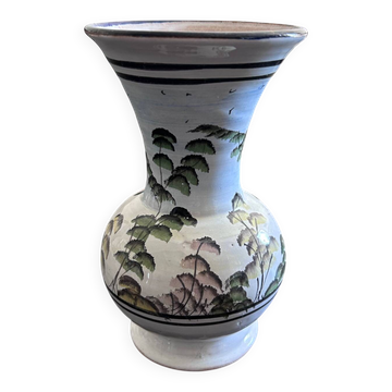 White vase with plant decoration
