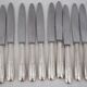 Share Art Deco cutlery set of 79 pieces, knives, silver-plated metal.