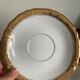 Pair of gold porcelain tea cups