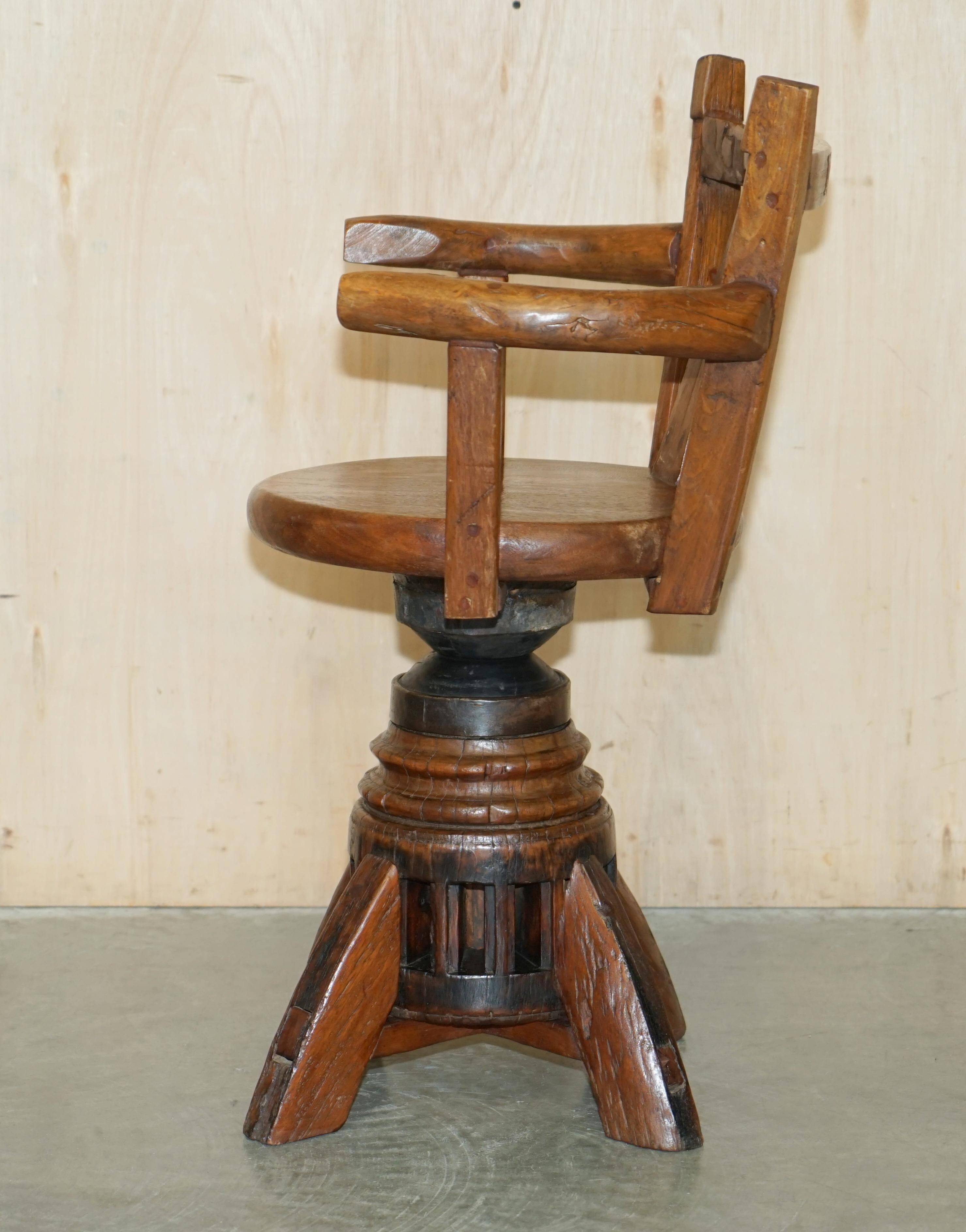 Antique captain's swivel chair on a draft horse wheel from around 1760.