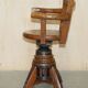 Antique captain's swivel chair on a draft horse wheel from around 1760.