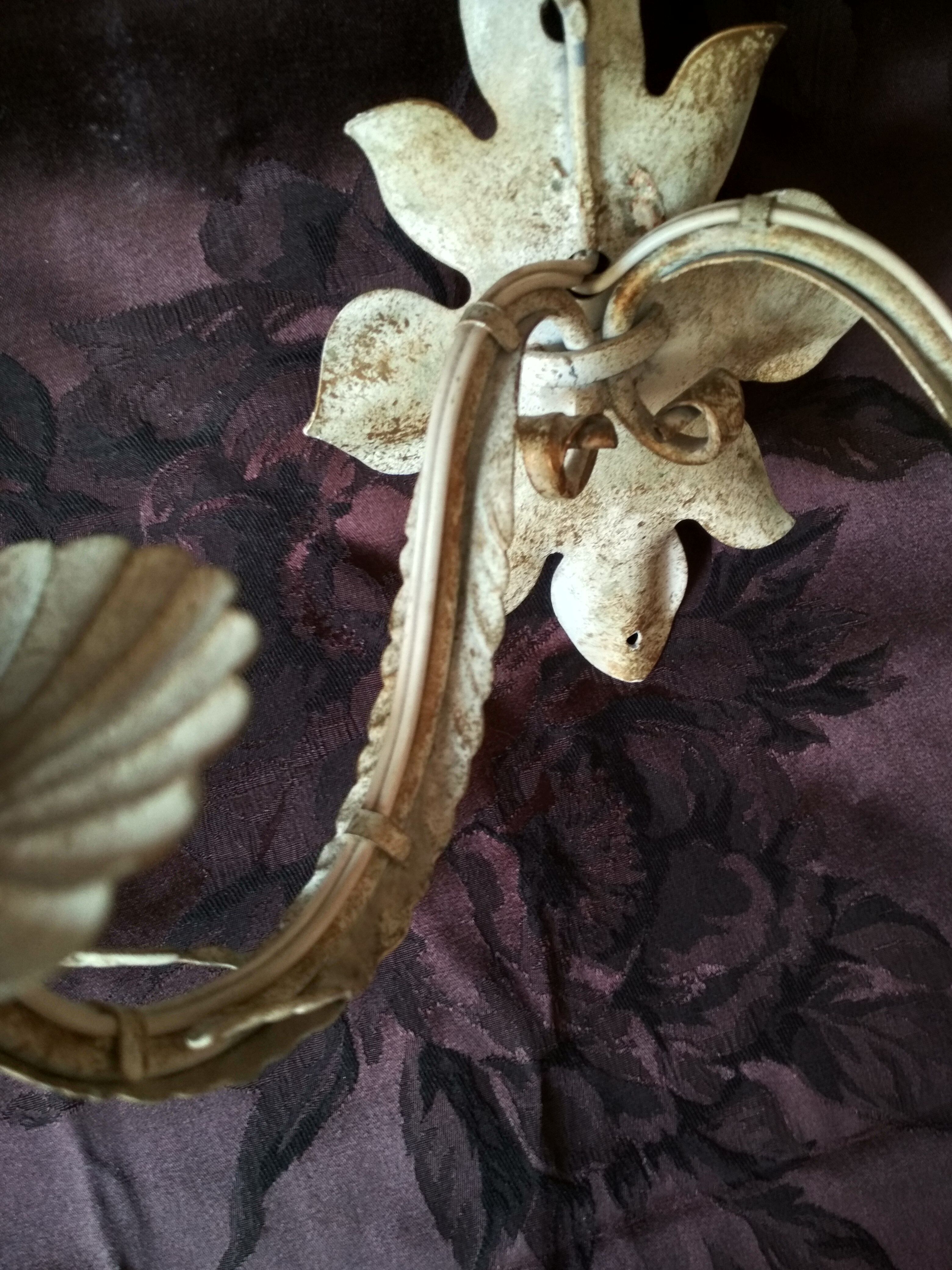 White glazed metal wall light with leaf and flower decor, 2 lights