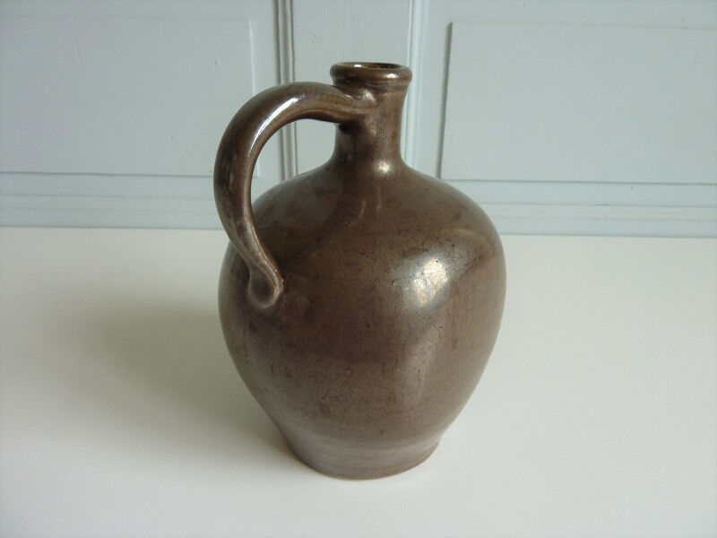 Verified sandstone water jug