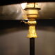 Black metal lamp and brass dore reglable tripod