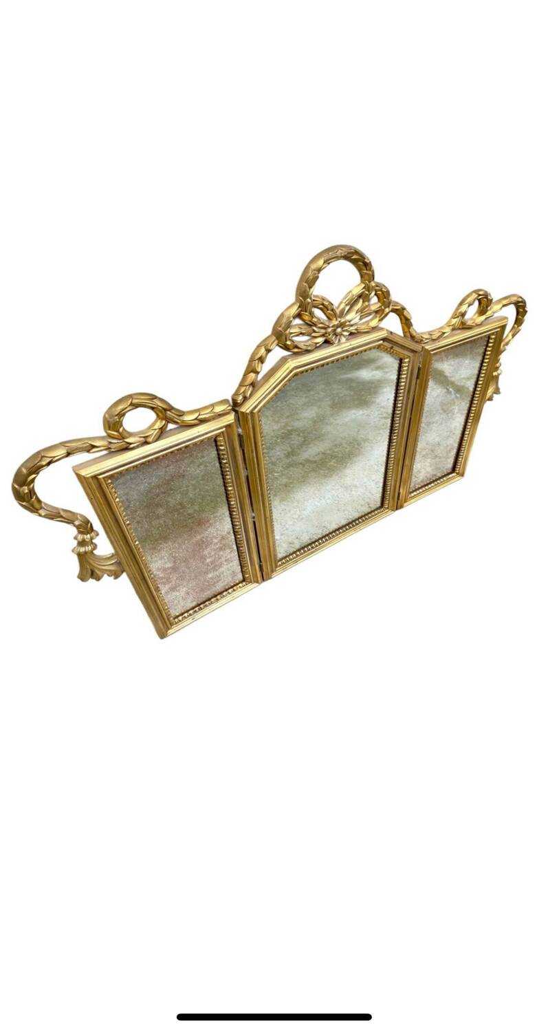 Miroir triptyque en bois doré et sculpté