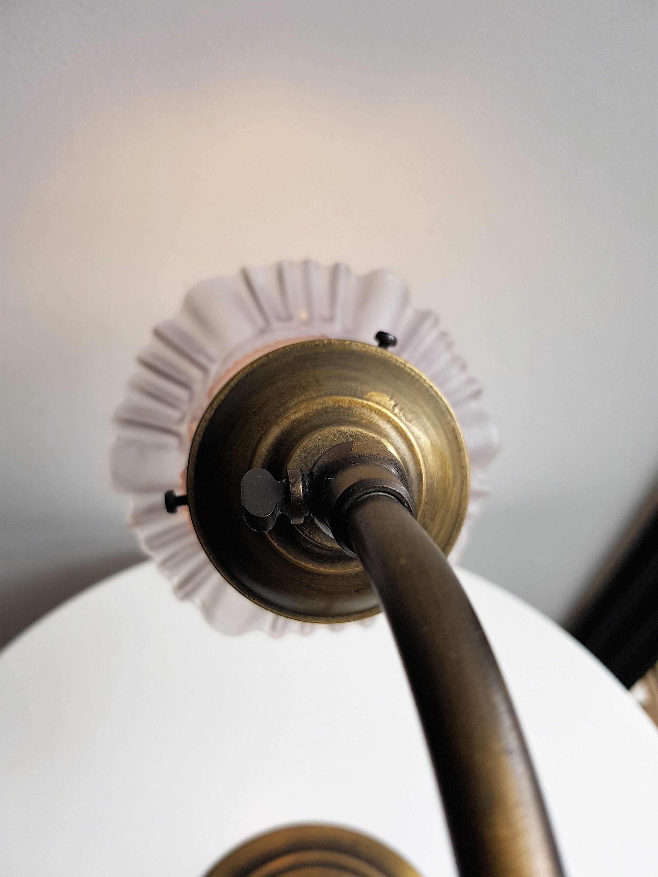 Articulated in brass and frosted glass lamp