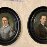 Pair of framed portraits