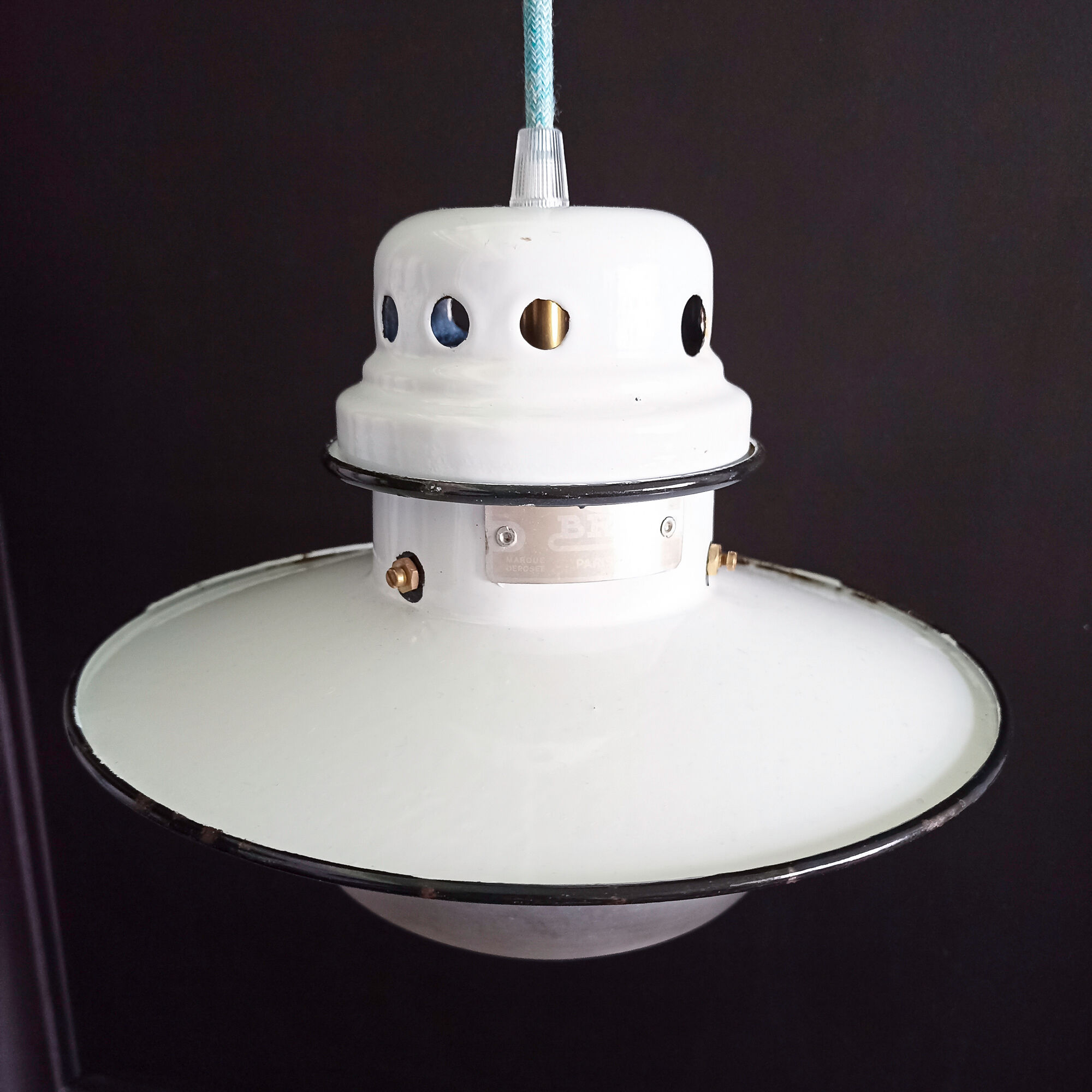 Old enamelled sheet metal suspension with glass cup