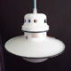 Old enamelled sheet metal suspension with glass cup