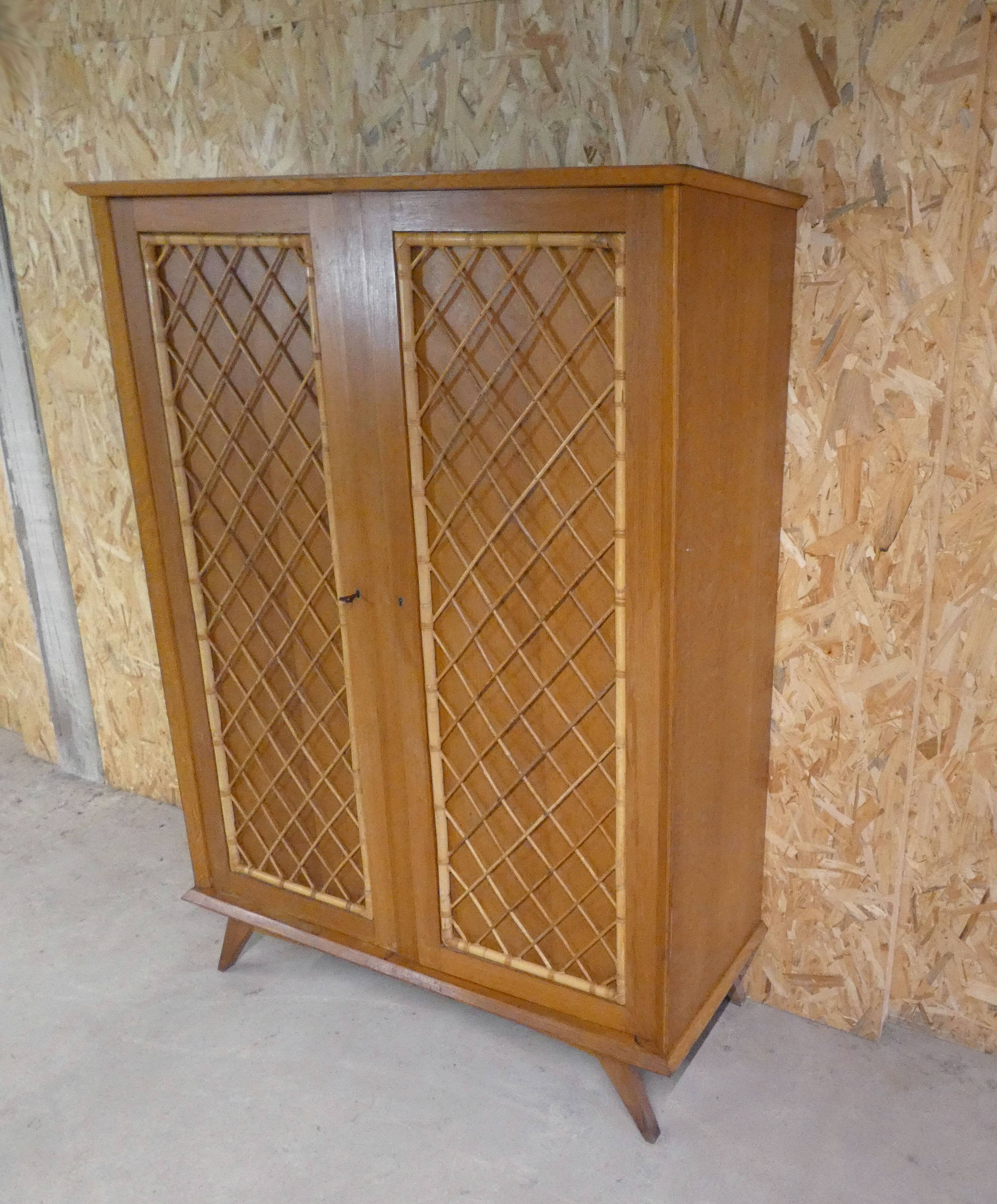 rattan cabinet with compass feet