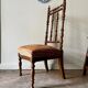 Turned wood and ochre velvet chair