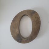 Letter O of sign in vintage gilded brass