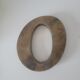 Letter O of sign in vintage gilded brass
