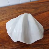 Shell holy water font emptier