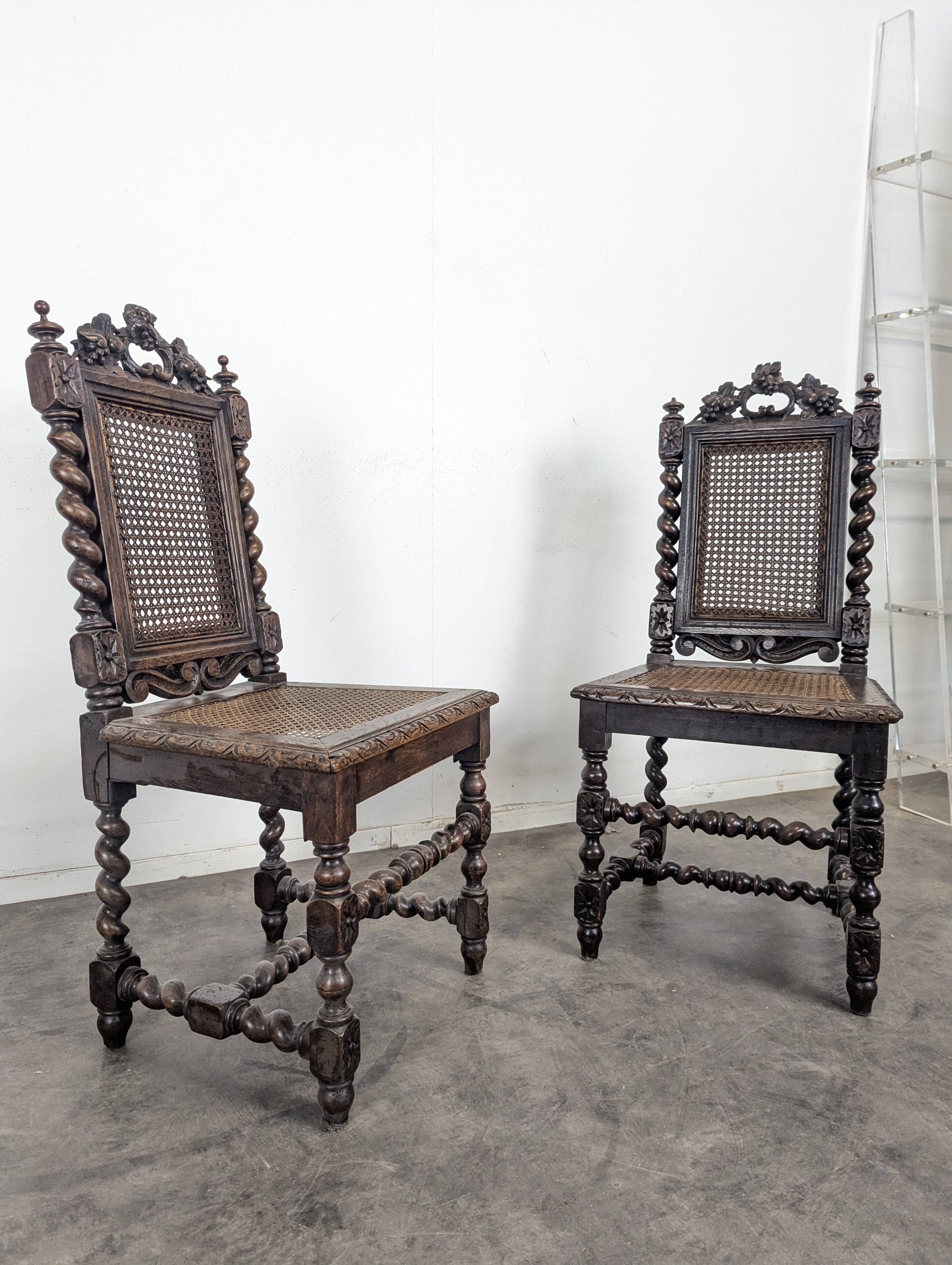 Pair of Louis XIII chairs in twisted oak with caning.