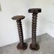 Pair of pedestal columns with oak pressing screws, 1900