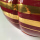 Large burgundy and gold vase