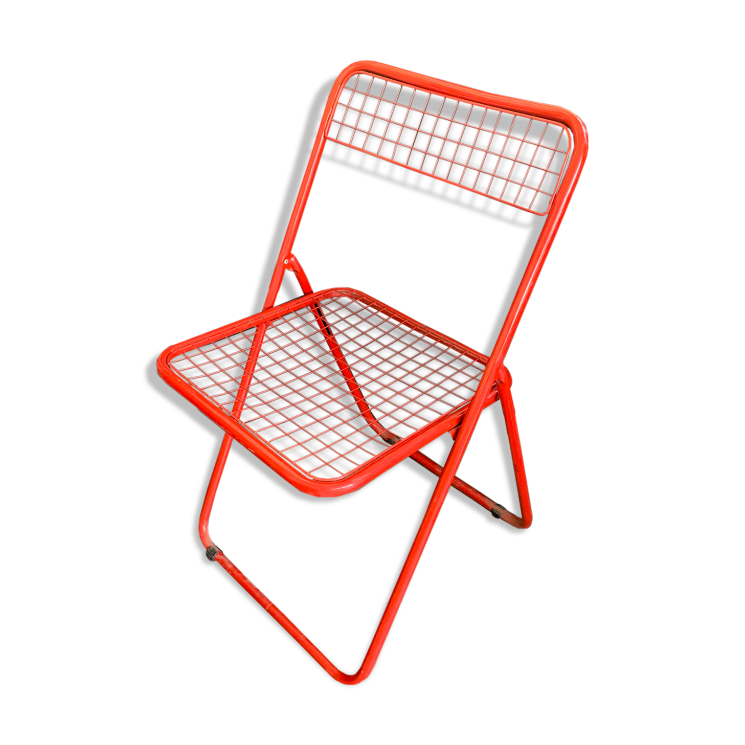 Red "Ted Ned" folding chair by Niels Gammelgaard