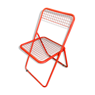 Red "Ted Ned" folding chair by Niels Gammelgaard