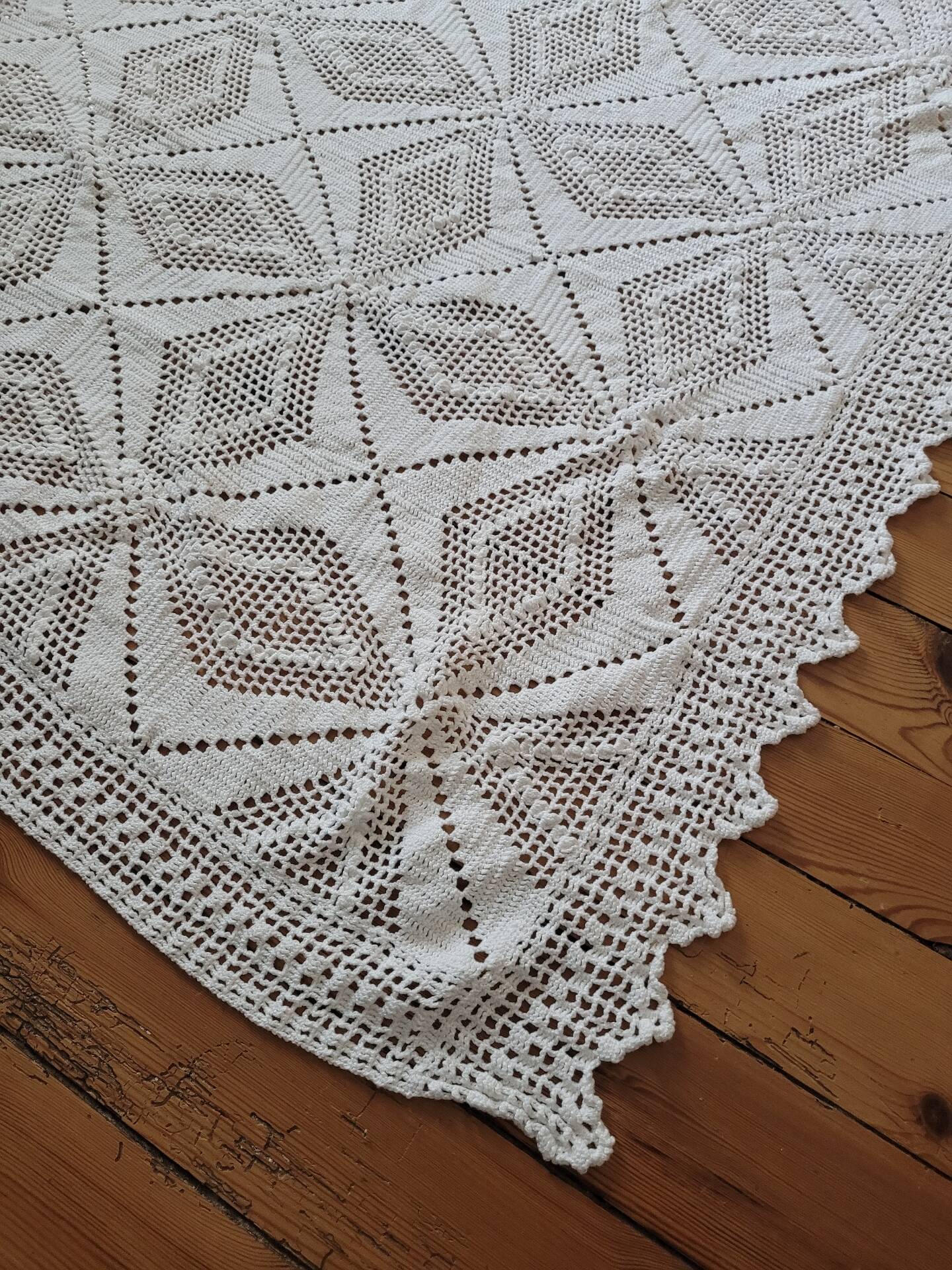 Large white crocheted bedspread
