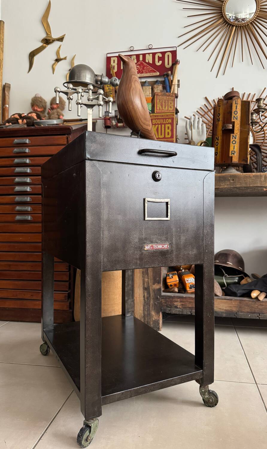 Old vintage industrial filing cabinet on wheels