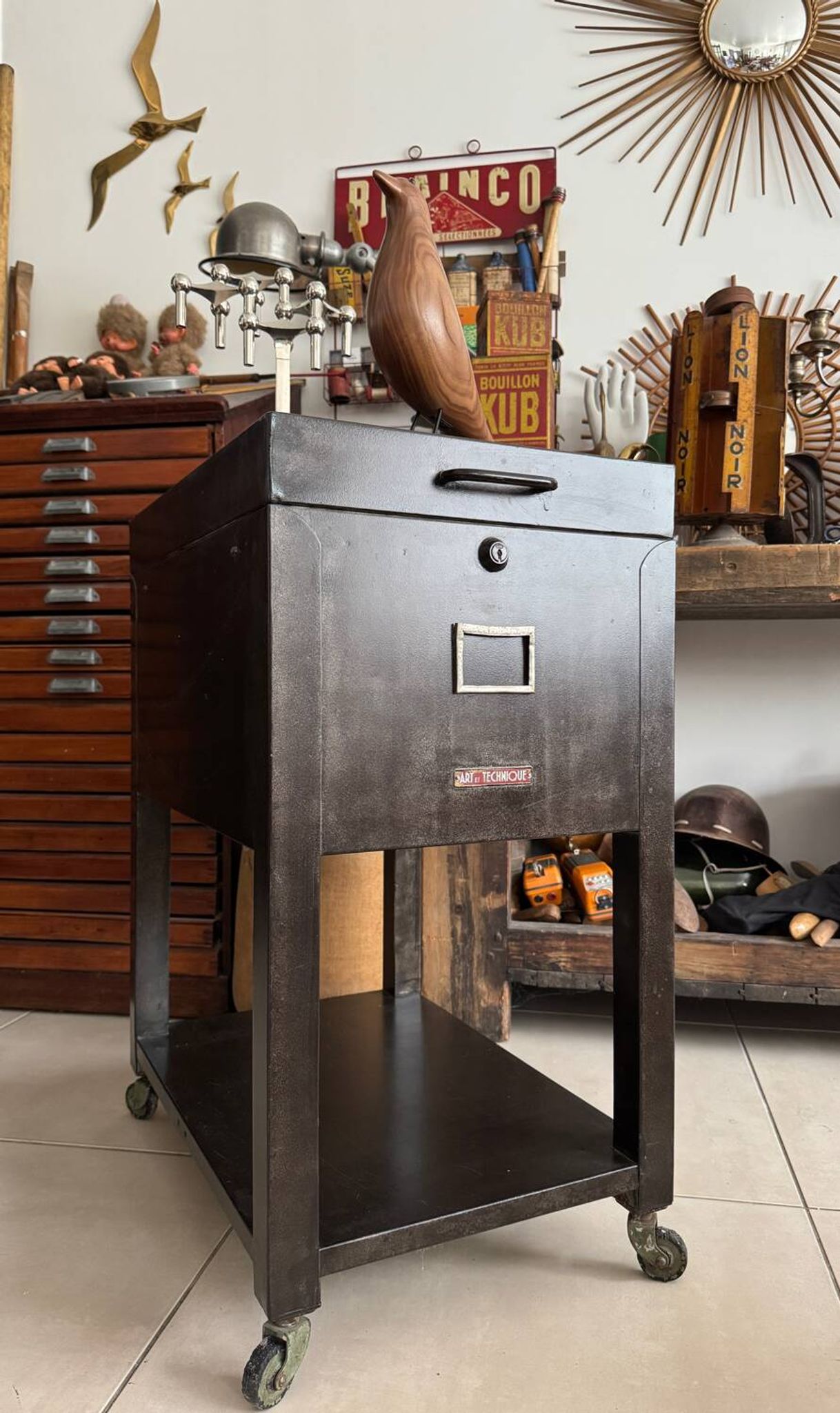 Vintage industrial filing cabinet on wheels