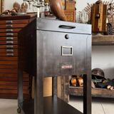 Old vintage industrial filing cabinet on wheels