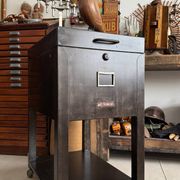Vintage industrial filing cabinet on wheels