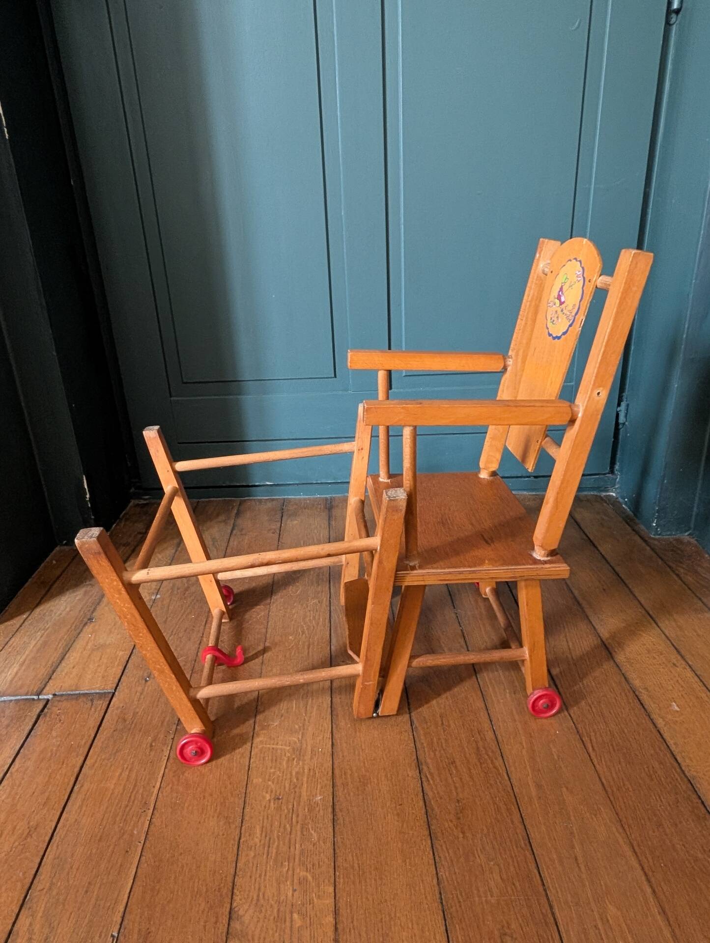 Doll high chair in wood – 1970s, foldable and on wheels