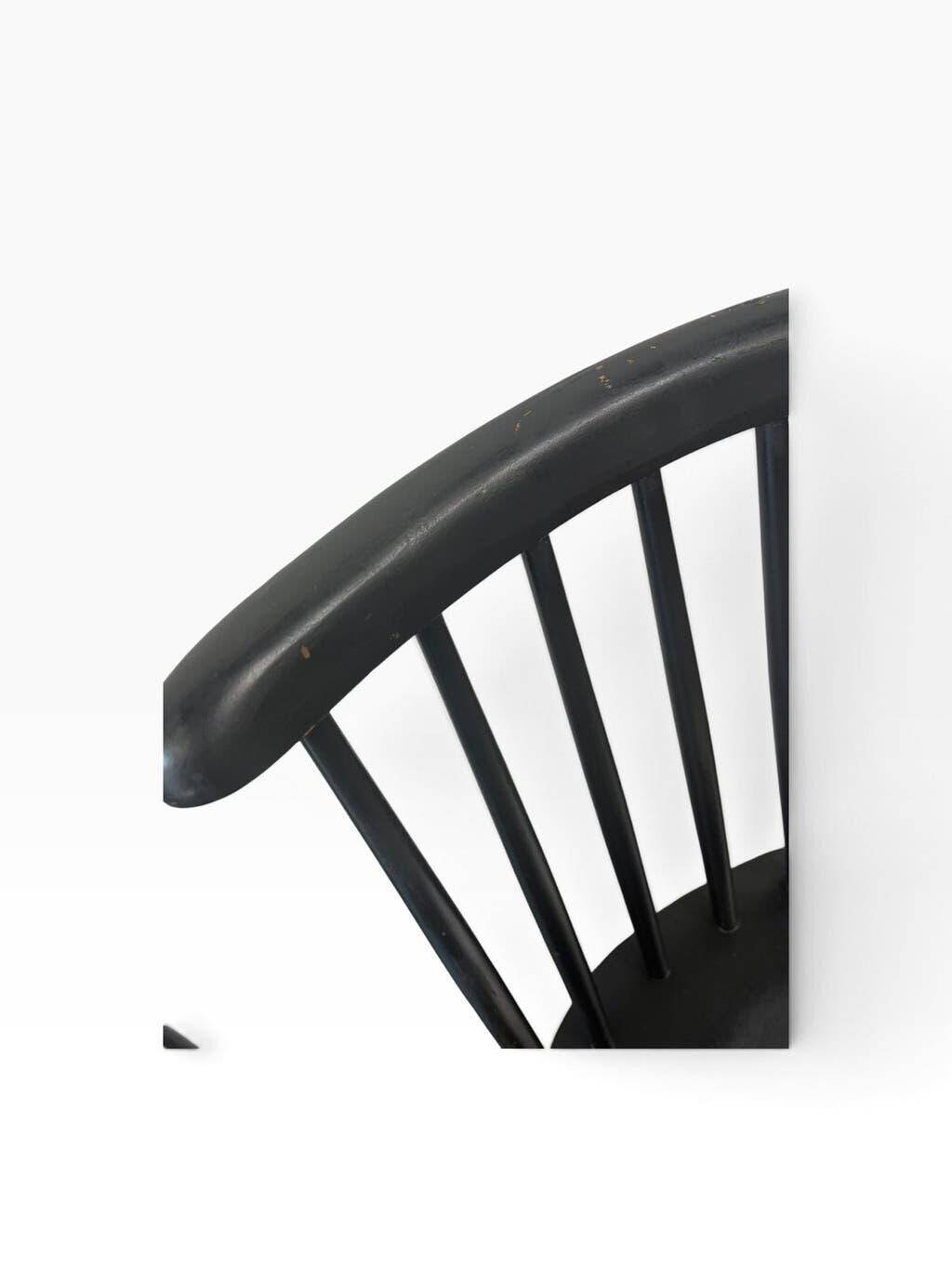 Set of 2 vintage black spindle wooden chairs