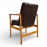 Fröscher leather armchair by Ib Kofod-Larsen, 1960