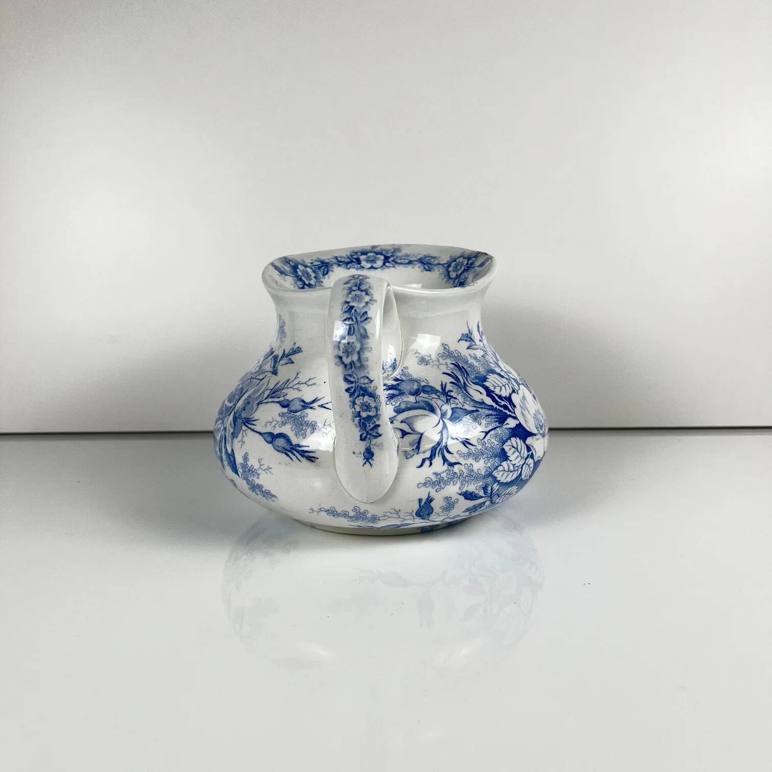 Chubby pitcher, old toilet jug KG Lunéville, blue flower pattern, late 19th to early 20th century.