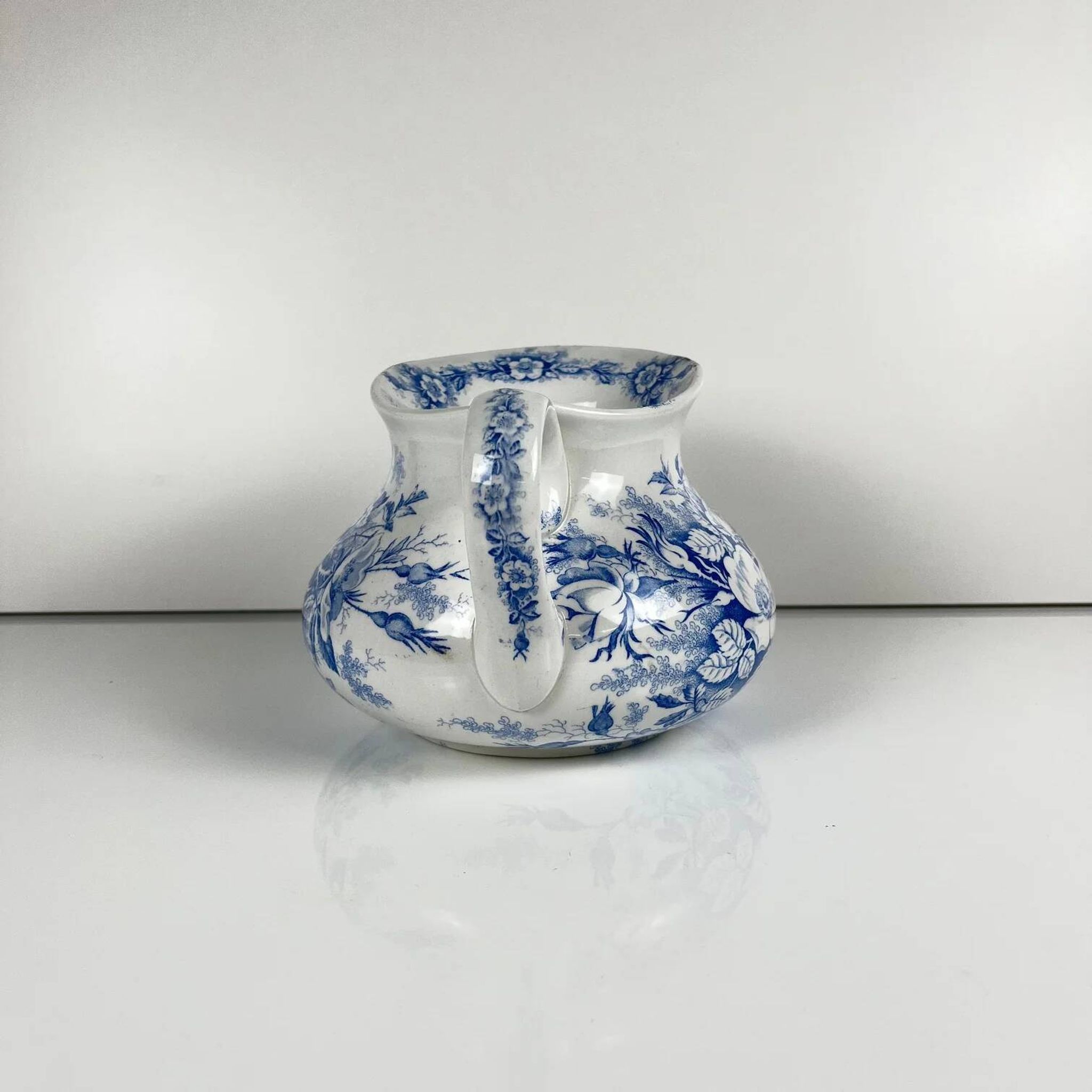 Chubby pitcher, old toilet jug KG Lunéville, blue flower pattern, late 19th to early 20th century.
