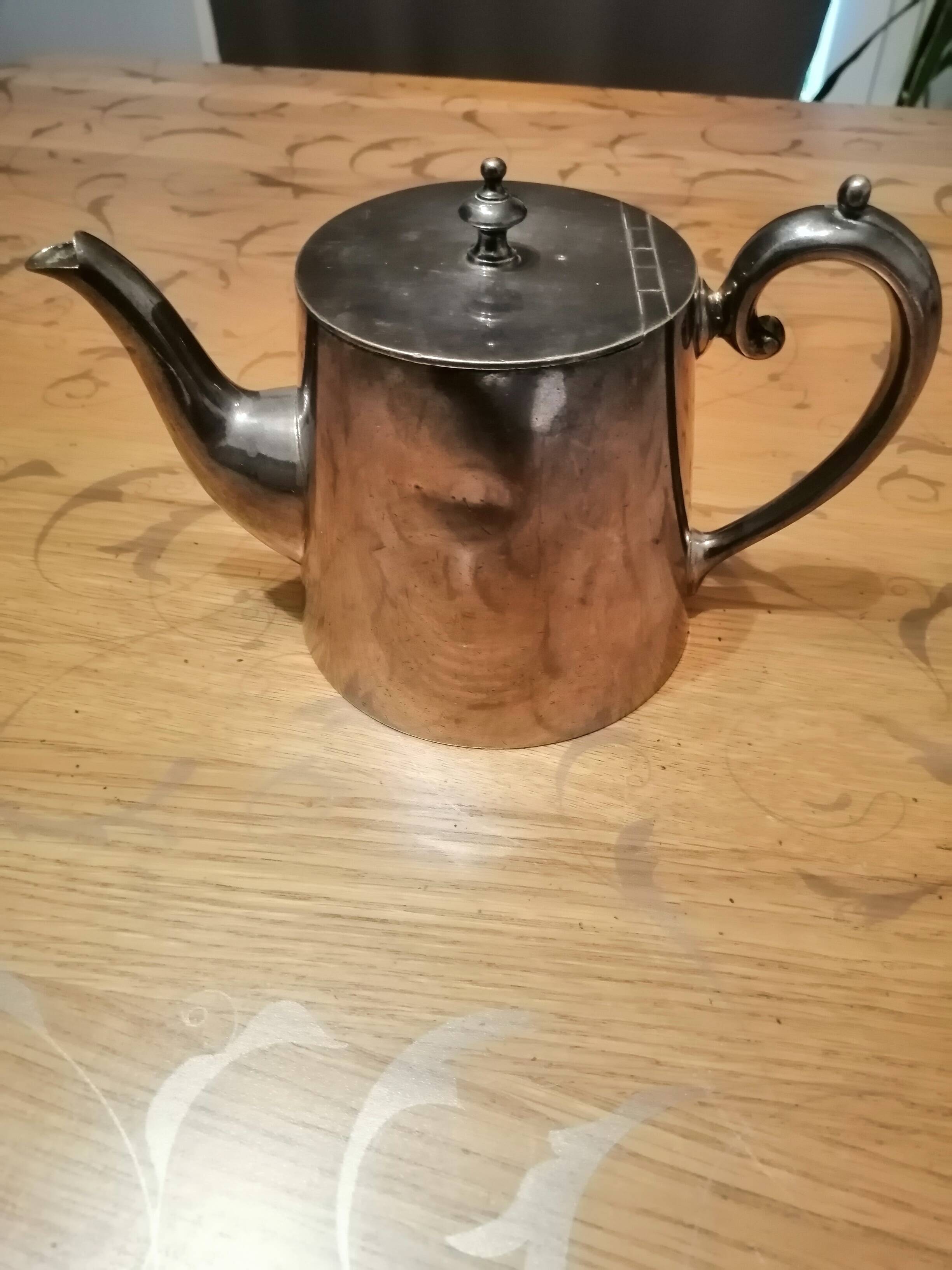 silver-plated teapot