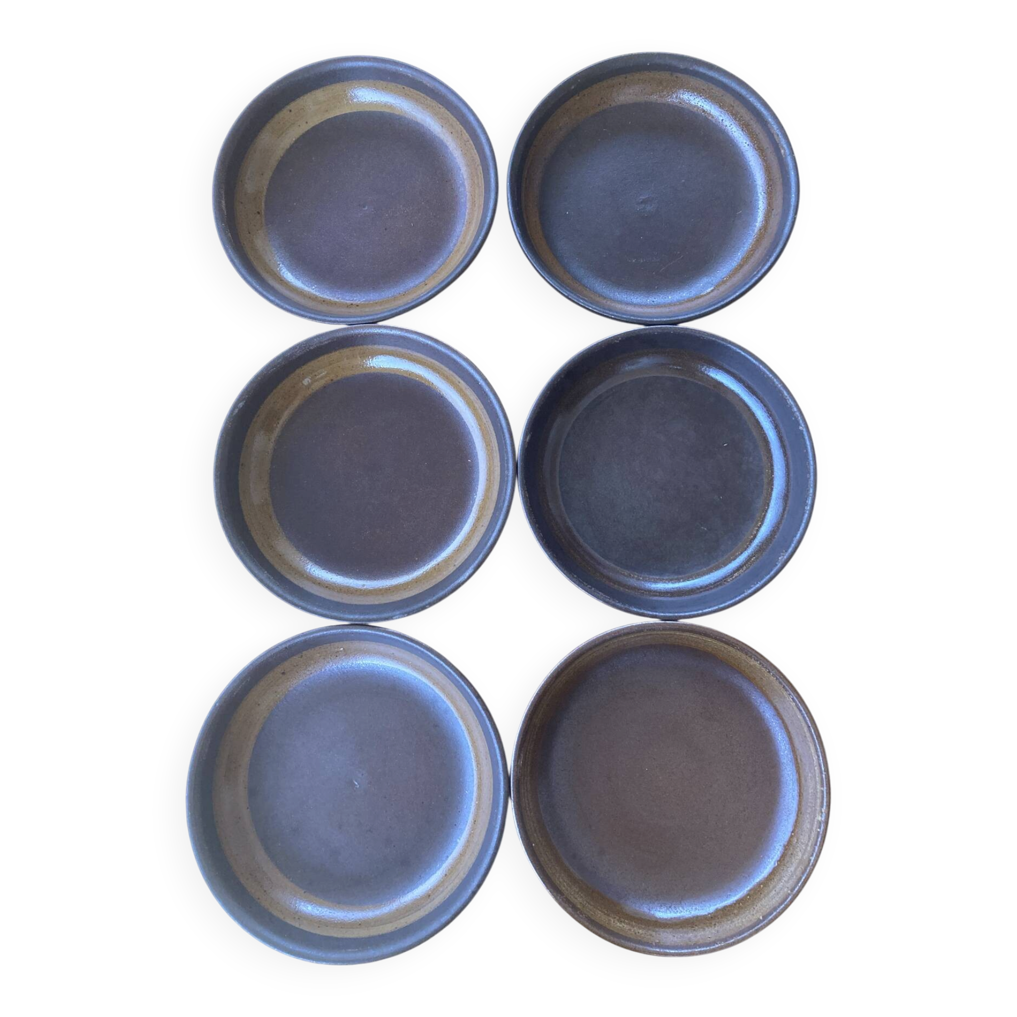 Organic earthenware deep plates from Gré du Marais, France.