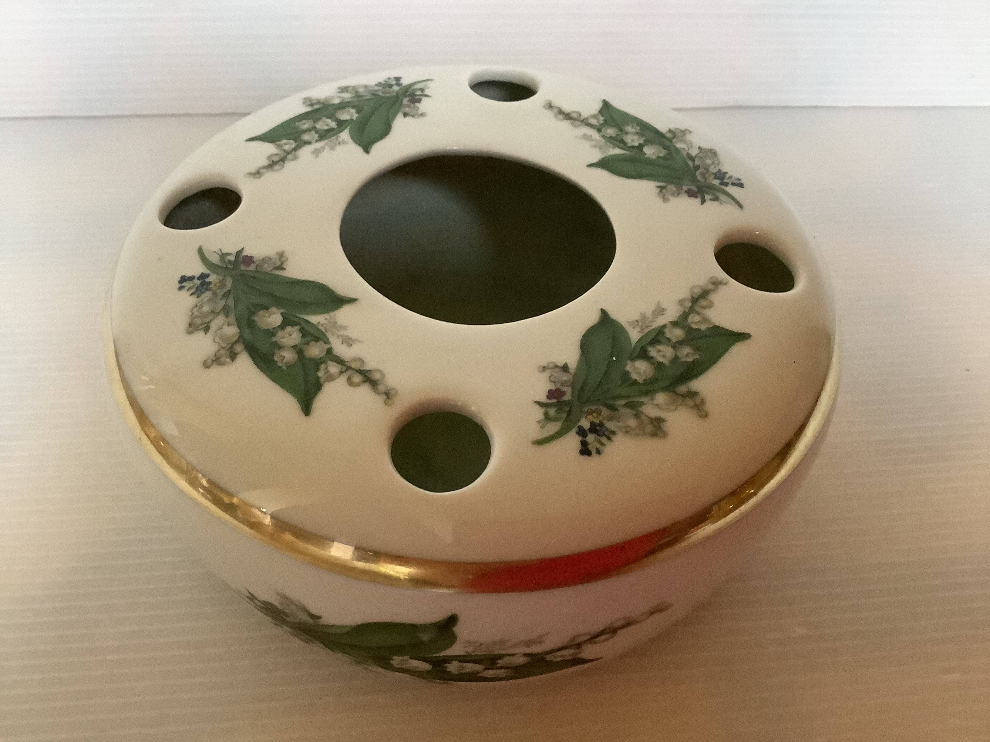 Vase with lily of the valley flowers bavaria