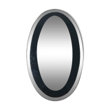 Oval wall lamp with mirror frame. 1980s 18x30cm