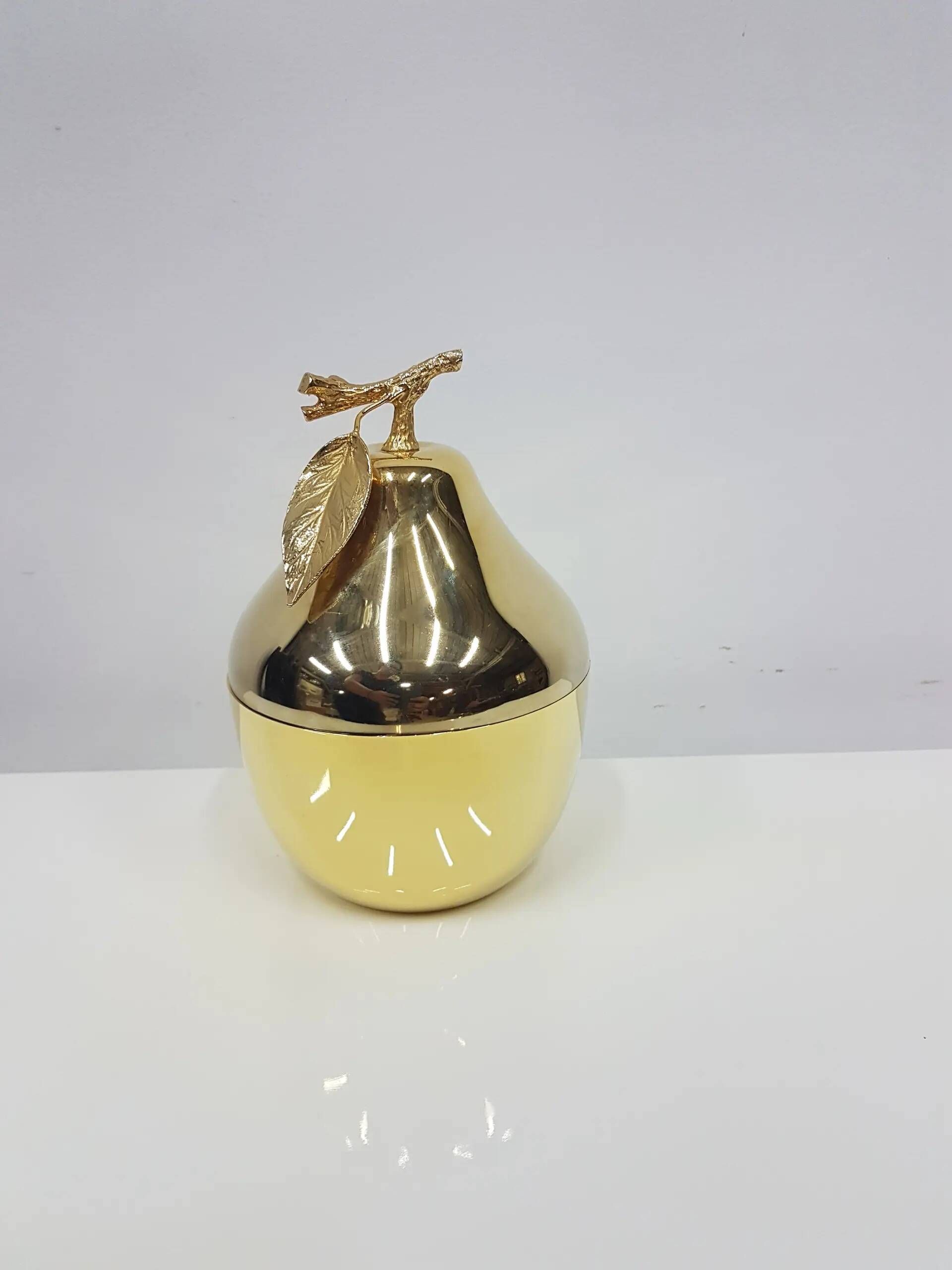 "Pear" ice bucket, gold-colored, gold-finished material, designed by H. Tur